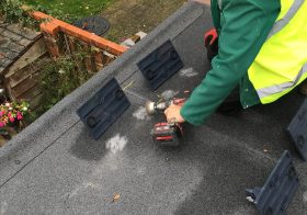Flat roof install, preparing the felt.